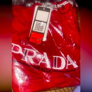 Red
Prada shirt
Size small